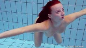 Redhead in the pool