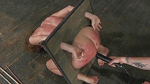 Mouth gagged with a piece of wood and ass spanked so hard that her butt turned red the hottie Rain experiences pain and pleasure beyond her limits. She never though things can get so rough and now hopes the executor will have compassion for her hot ass. Stay with her and see how else she will get humiliated and punished