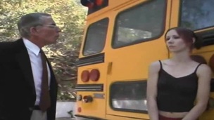 Aged dude bangs the natural honey right next to the school bus